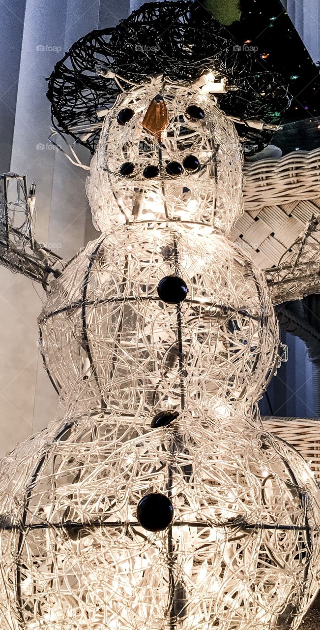 Artistic snowman with lights