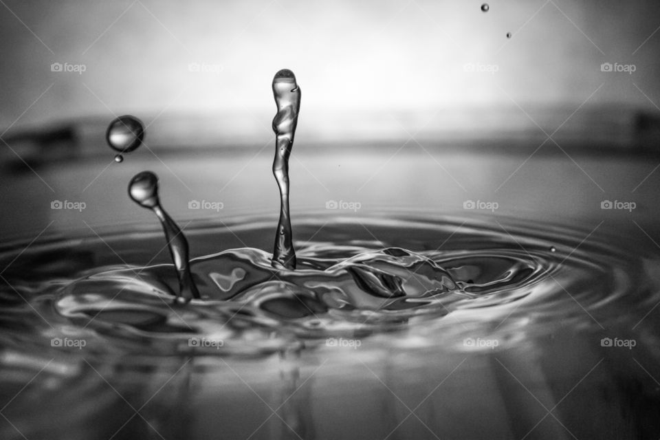 Water drop on rippled surface