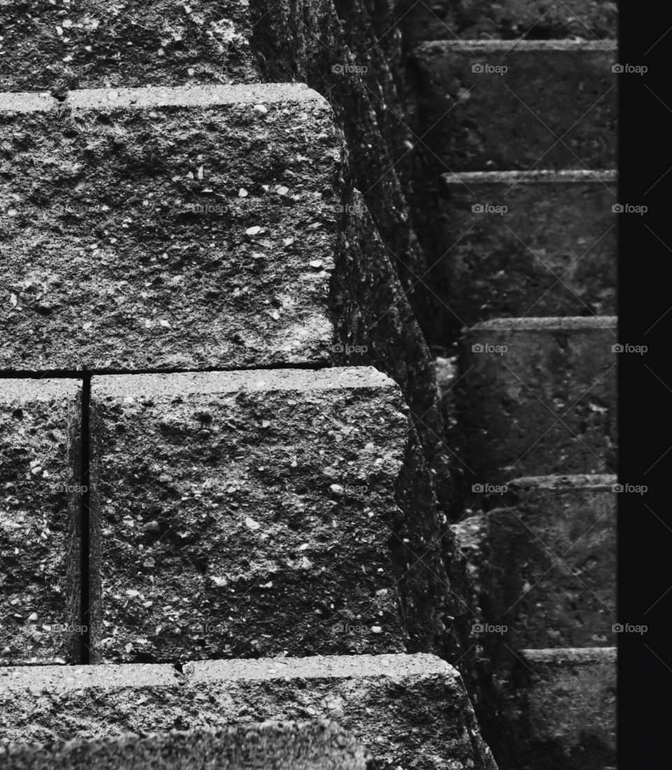 Brick wall and stairs in black and white
