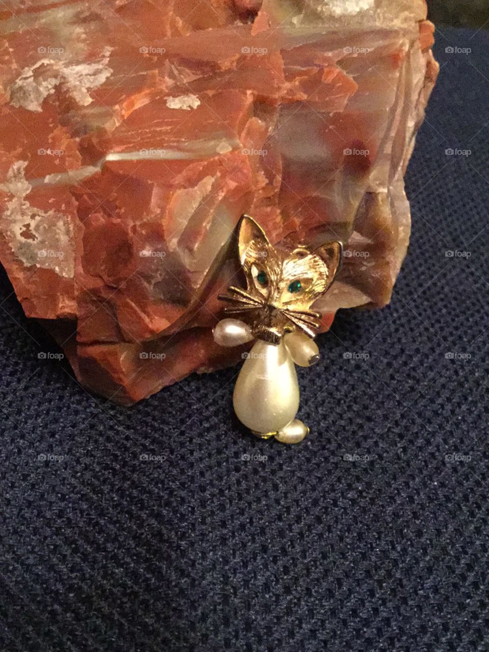 Vintage Pearl Gold Mouse with Emerald Eyes on Petrified Wood