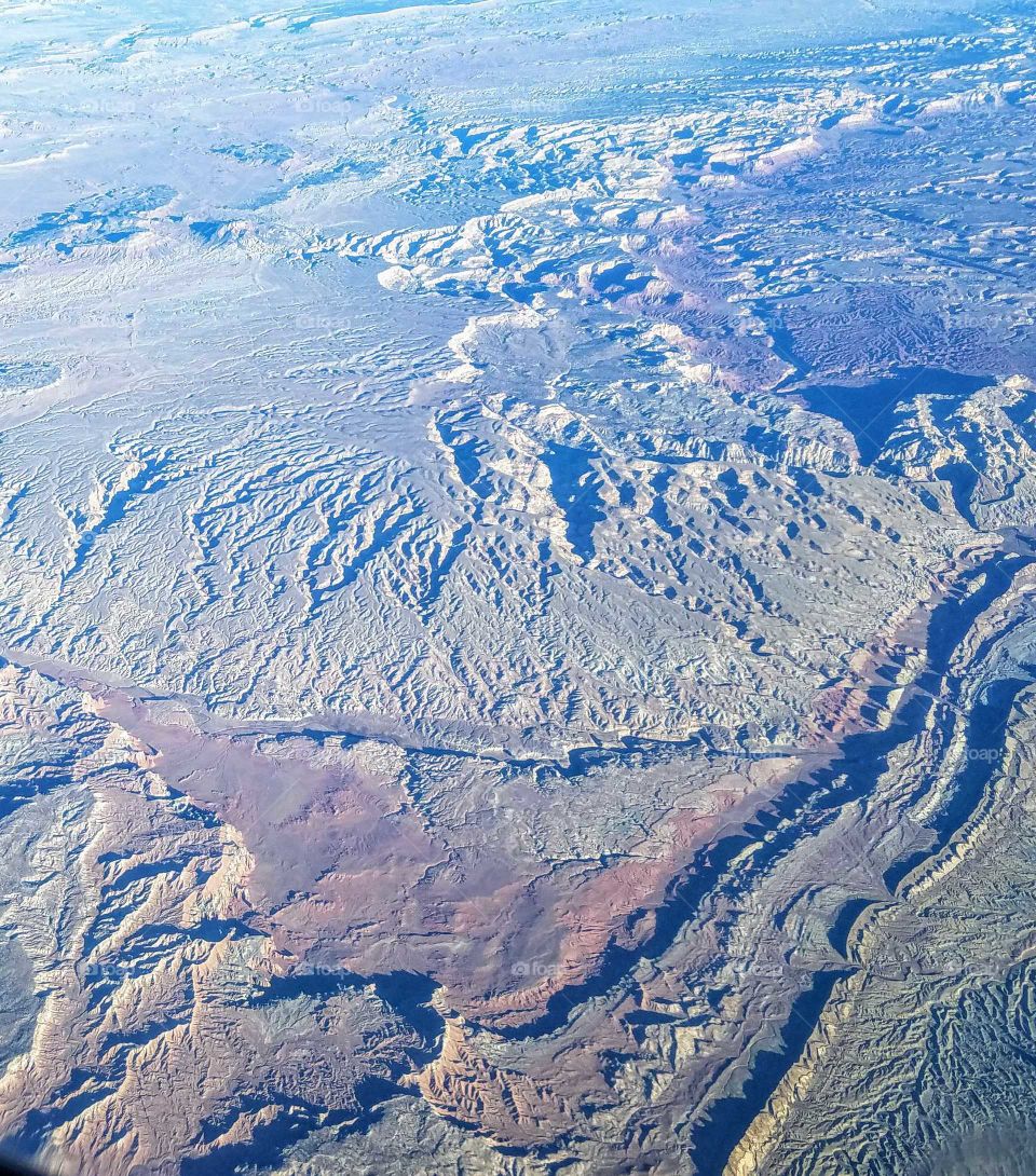 Up above the Grand Canyon looking to the left corner is the Colorado River cutting its beauty