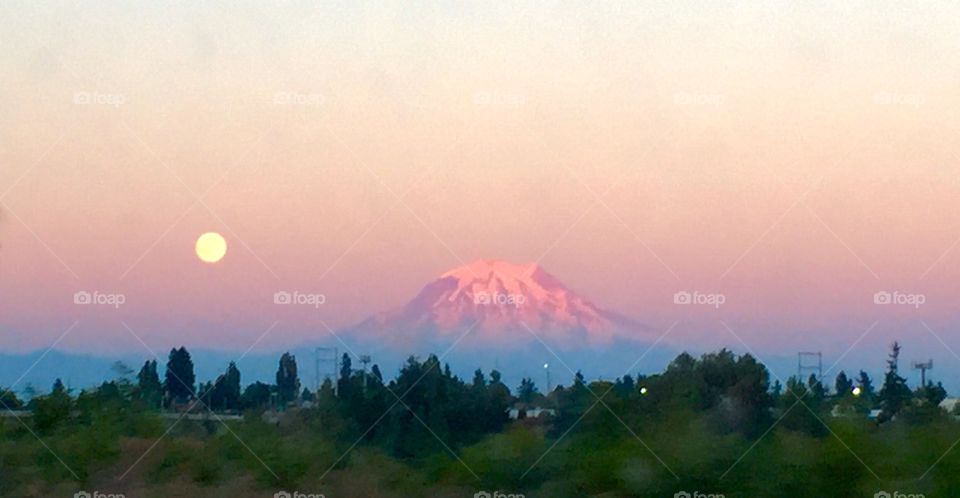 Moon and mountain by sunrise