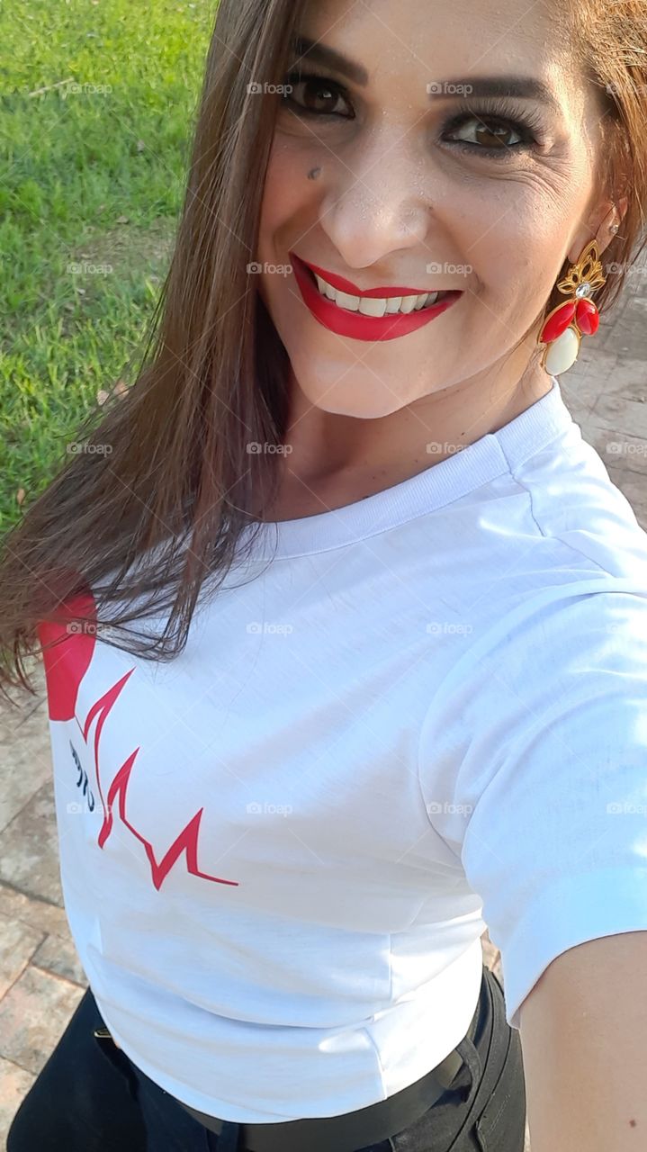 woman smiling in the park