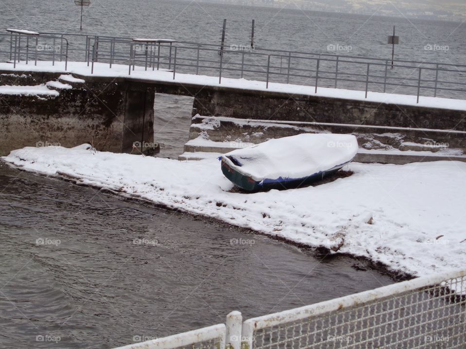 Boat filled with snow