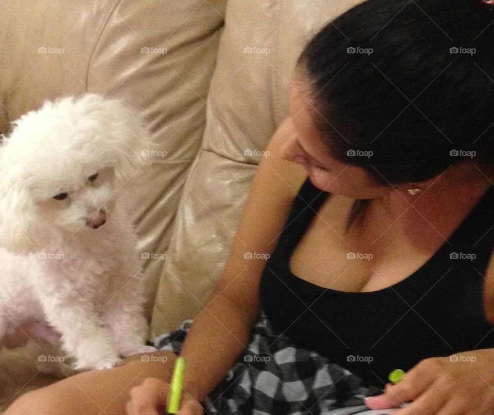 Showing this guy how much it costs to go to college in the United States. He is getting a scholarship because he IS smart. 