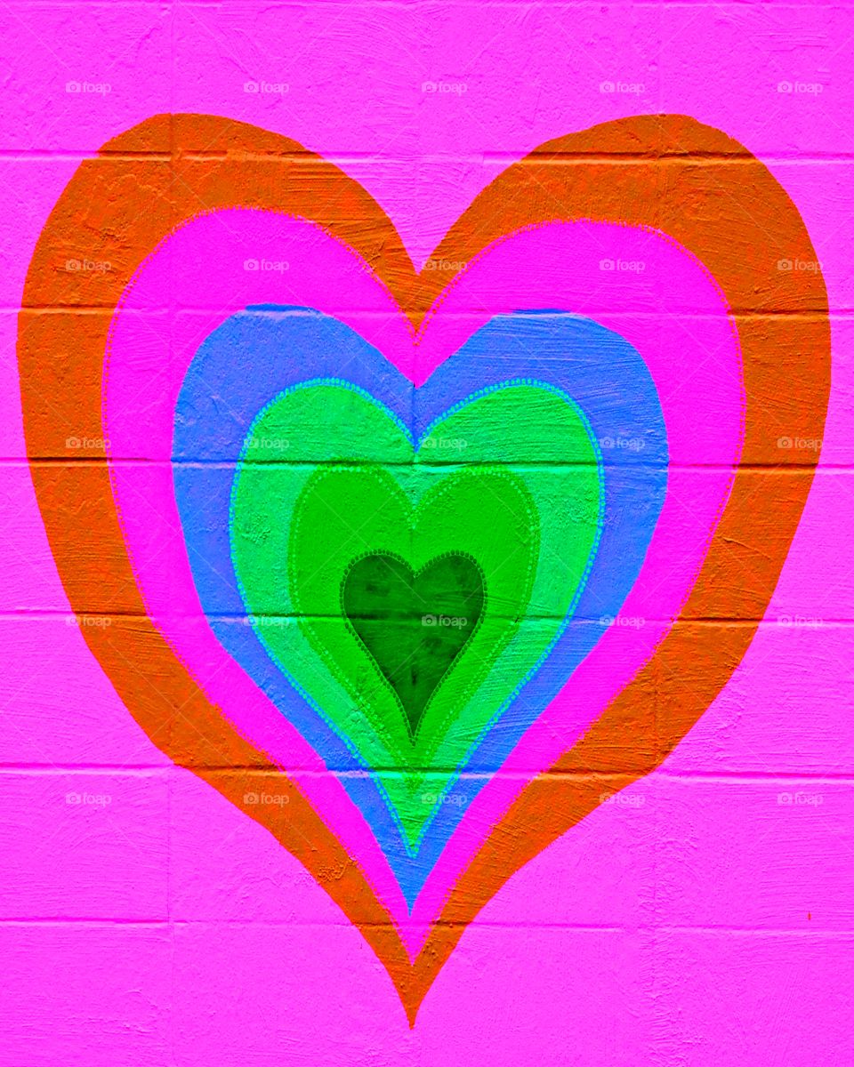 The best known, universal symbol of love is the heart-shaped ideograph, and it symbolizes the core of romantic love, affectionate emotion and caring.