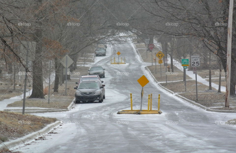 Icy road. Icy road with snow and street signs