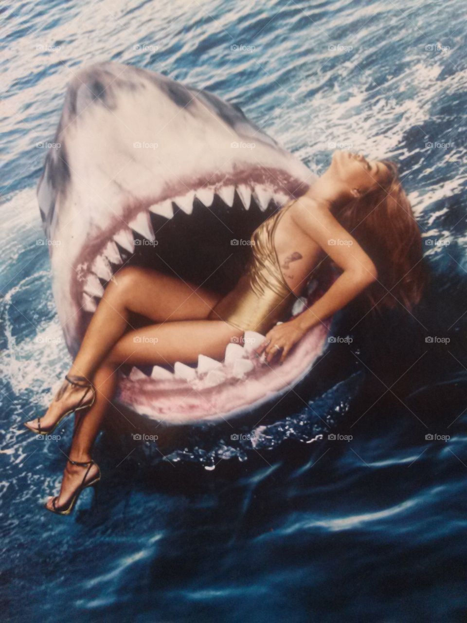 magazine cover. jaws teeth on a woman (magazine cover) 