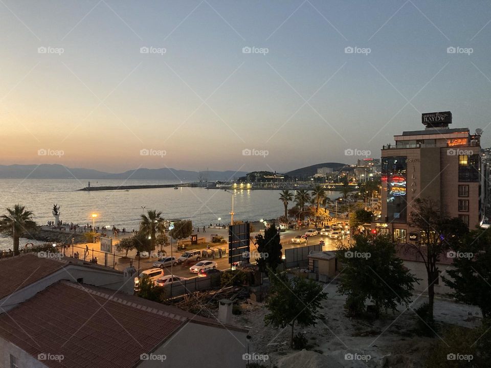 Sightseeing in Turkey. Blue sky and tall palm trees. Sunsets and sunny days. Summertime in Kusadasi. Vacation travel in Turkey . Summer view. Sunny day during vacation. Hidden gems and secret places.