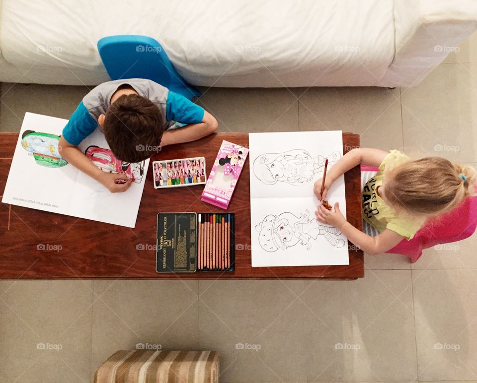 High angle view of kids painting