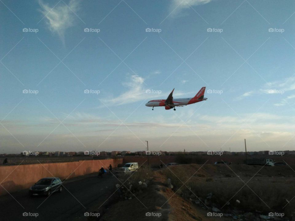 Beautiful airplane flying cross the sky