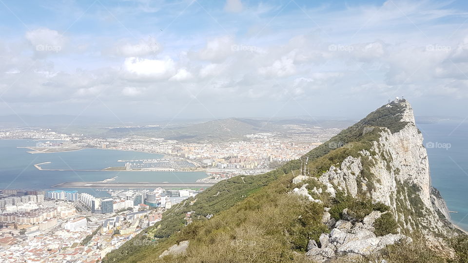 view of the rock in Gibraltar, and landscape of city and ocean below, nature