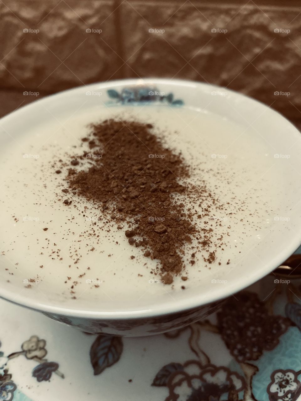 on the plate, sahlab with cinnamon 