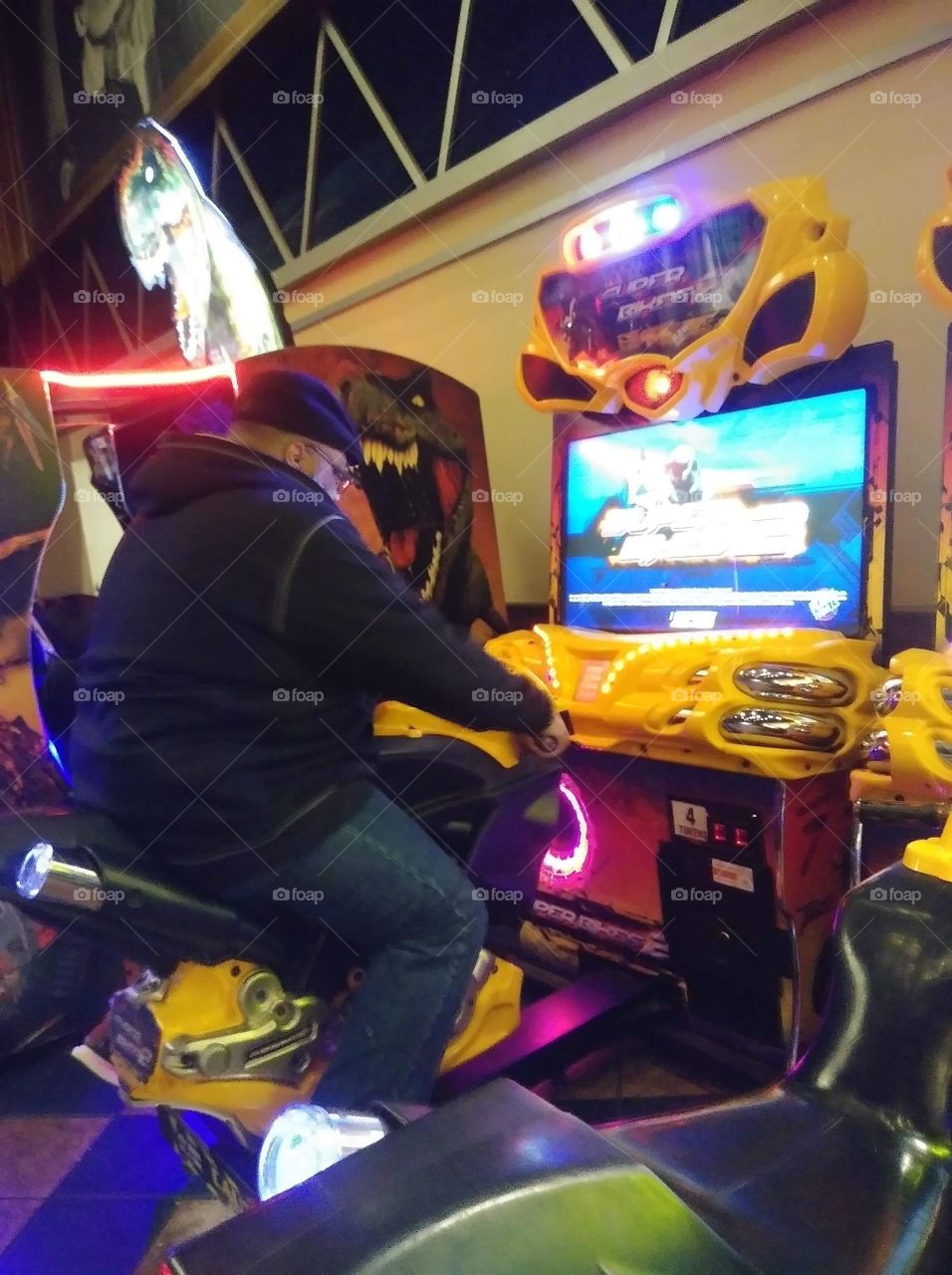 Enjoying a game at the arcade