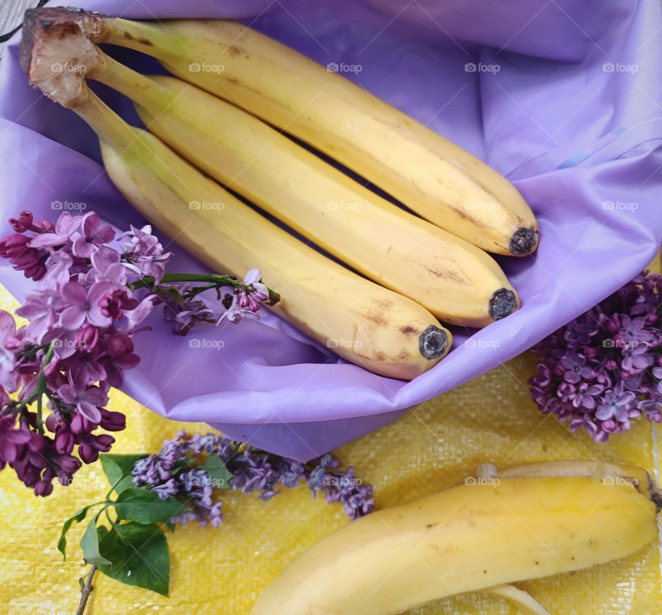yellow bananas in the purple bag.