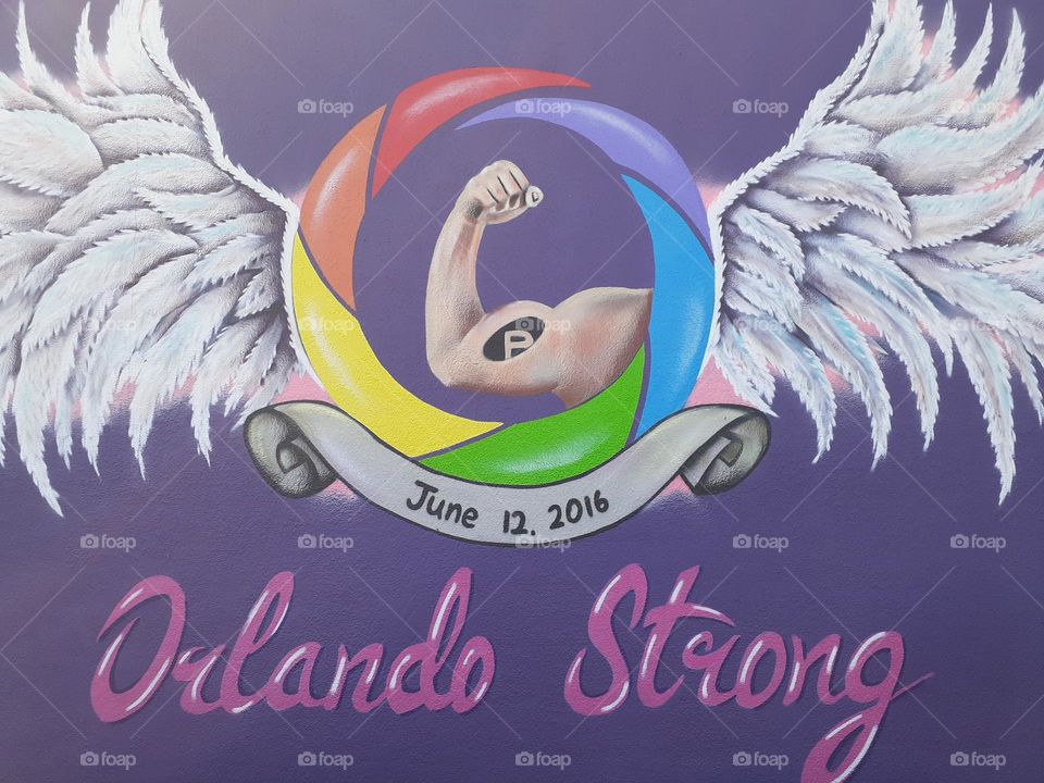 A mural outside the LGBTQ+ Center that remembers the victims and survivors of the shooting at Pulse Nightclub, June 12, 2016.