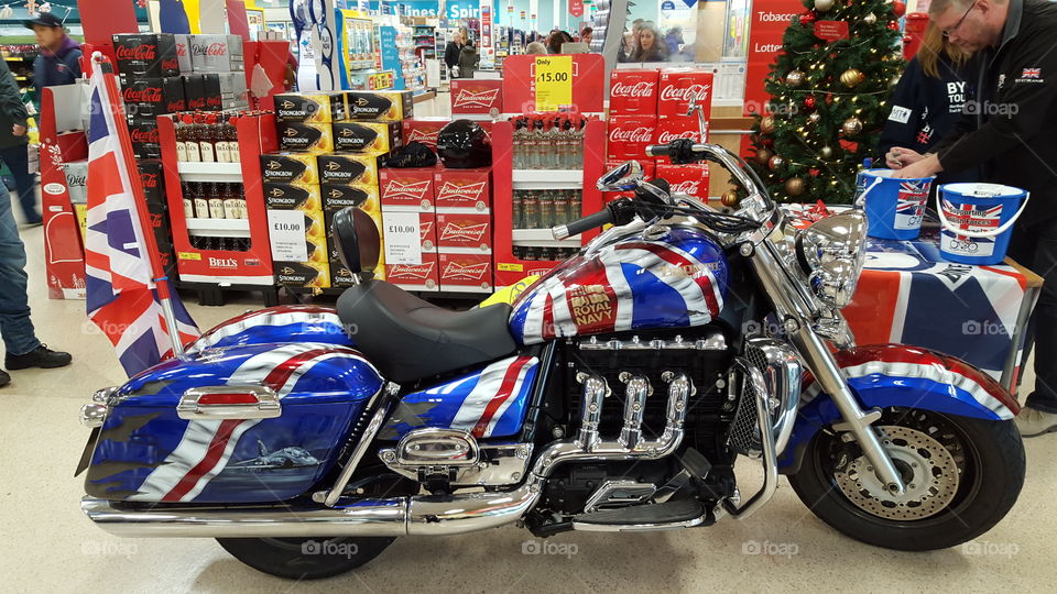 Amazing motorcycle in grocery store display.