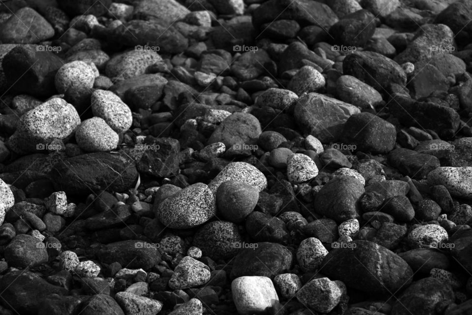 River rocks and pebbles in black and white