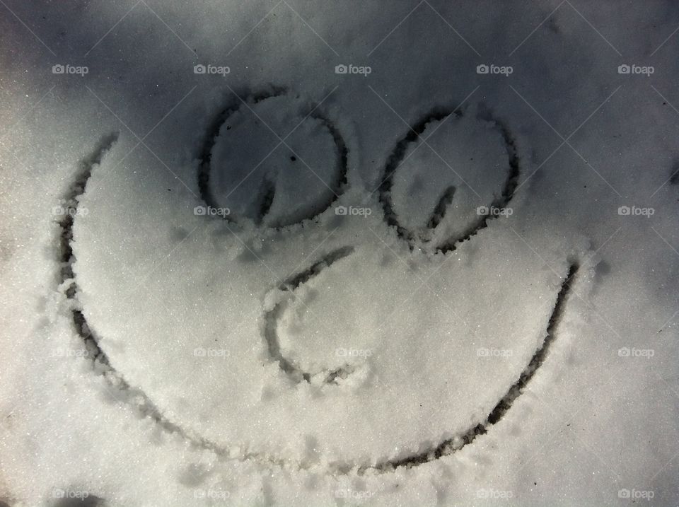 Snowy Smiley. Drawing smileys in the snow 