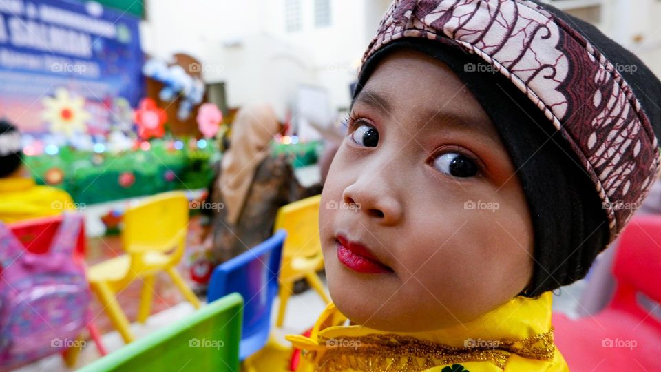 close up photo of little asian girl.