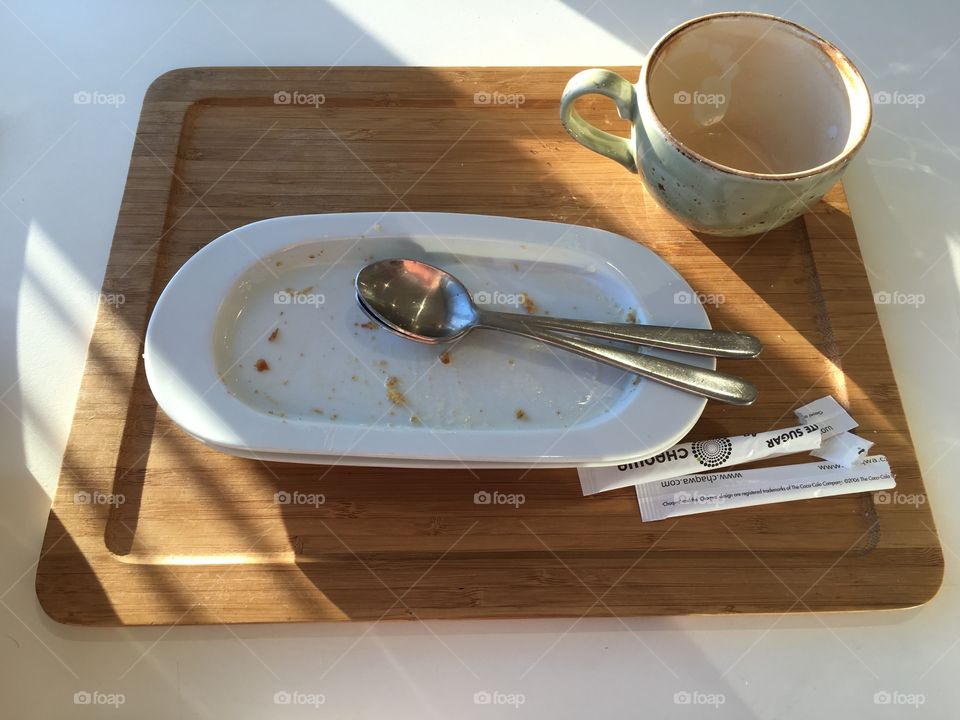 Empty cafe plate and coffee cup