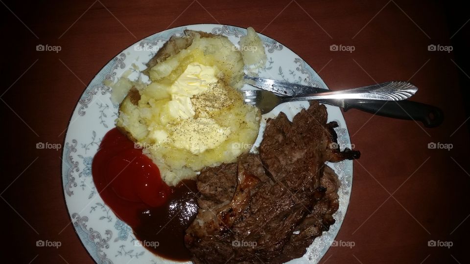 steak and potato dinner. my husband cooked a great dinner