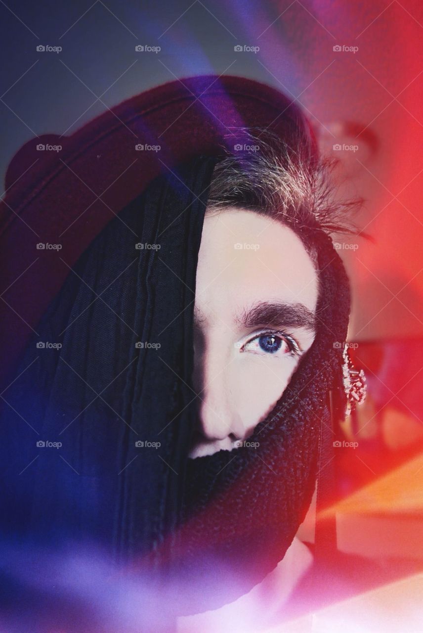 Covered Up. Colorful boy while his innocence is taken
