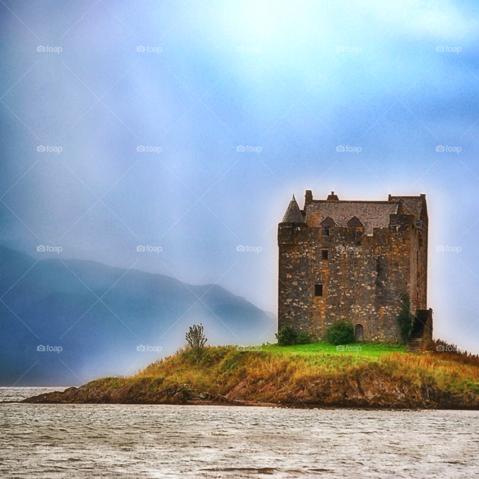 sky castle stalker scotland water by selecshine