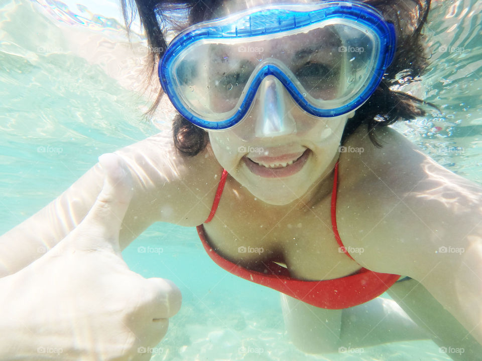 girl underwater. girl underwater wearing diving mask