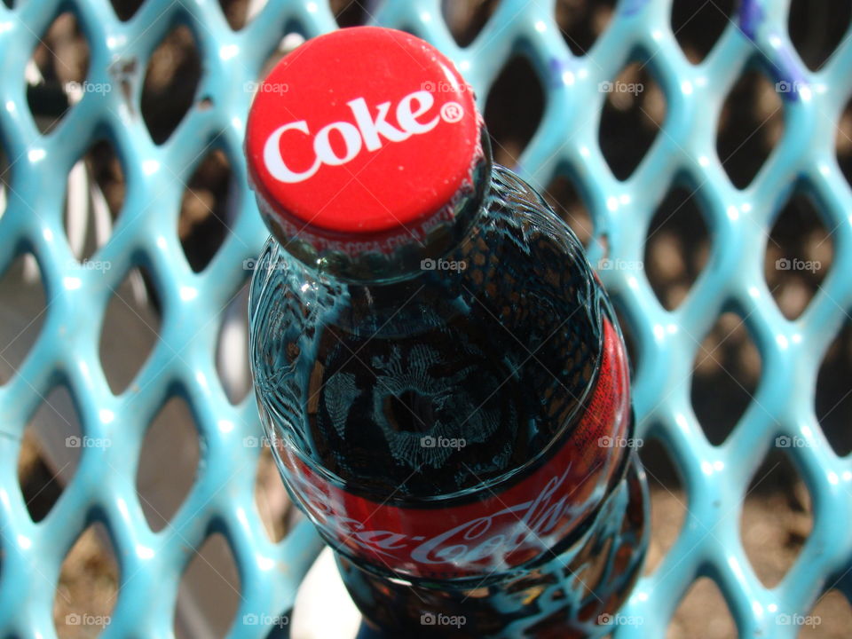 Coke on a park table