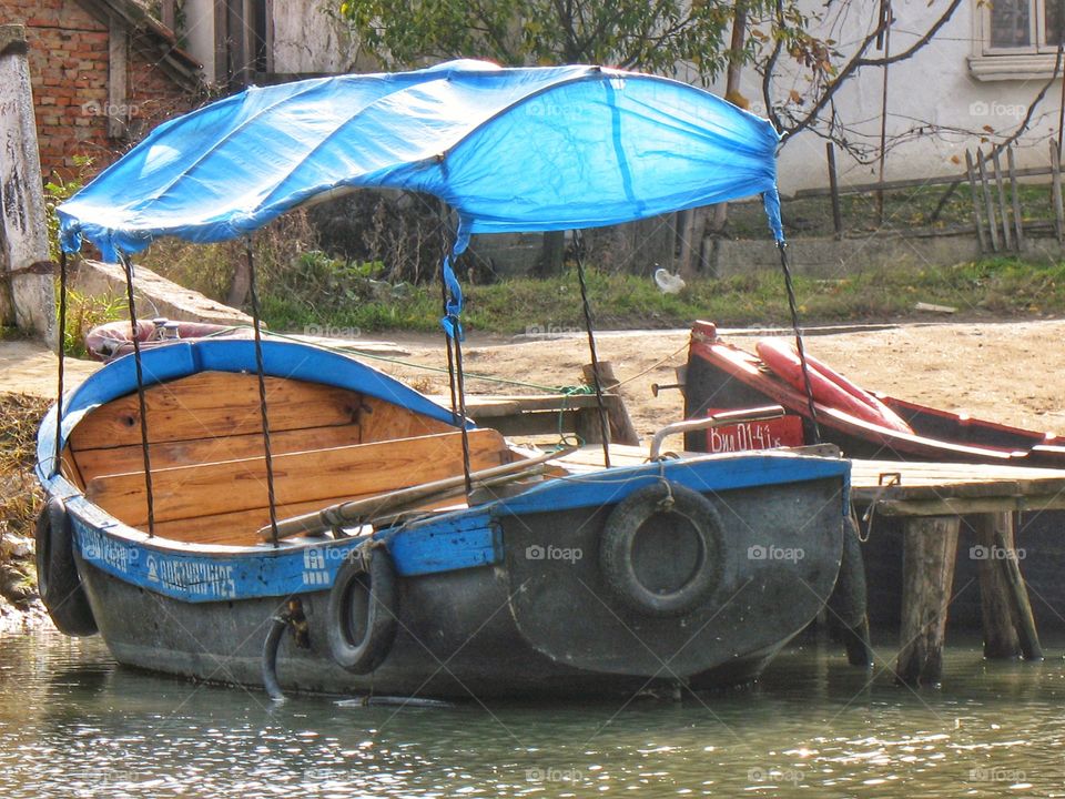 boat at the Vilkovo jetty лодка у причала Вилково