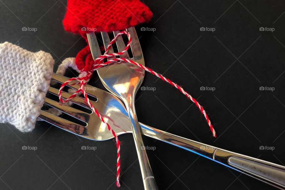 Forks Martenitsa. A Martenitsa is a piece of adornment, made of white and red yarn and usually in the form of two dolls, a white male and a red female. Every year on 1st of Martch, Bulgarian people exchange Martenitsa for health and good luck