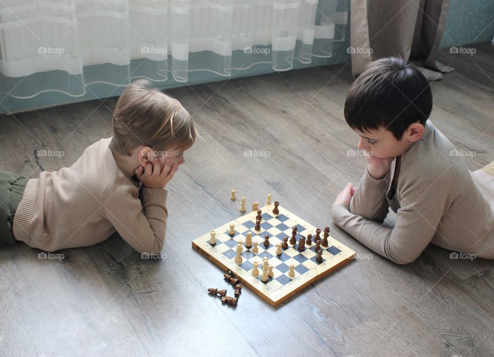 children play chess