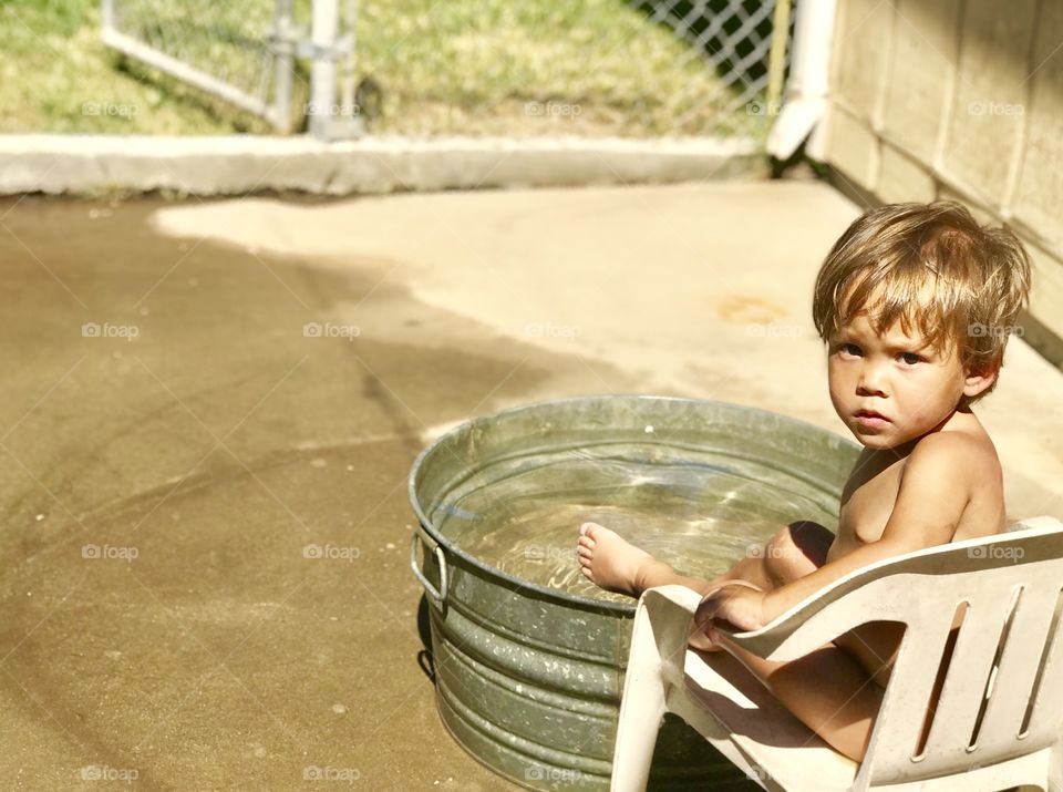 Andrew was playing in the backyard 