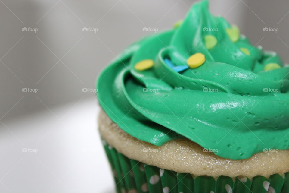 White Cupcakes with Green Buttercream Frosting 