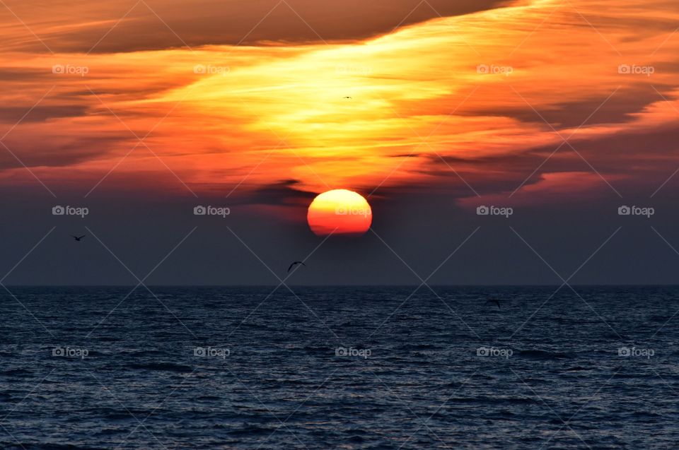 Amazing sunrise over the baltic sea in gdynia, poland