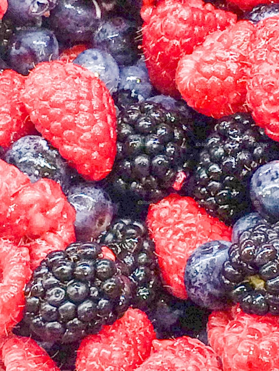 Raspberries, black berries, blue berries