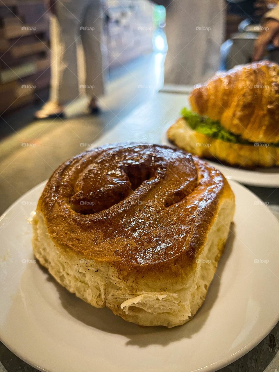 Cinnamon rolls in close up view on a table of a cafe 
