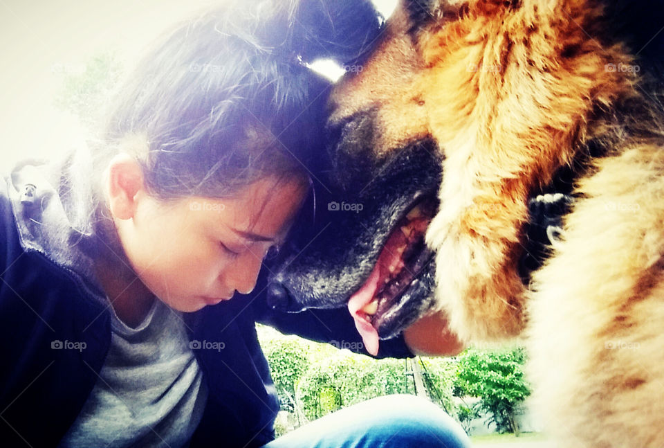 Travel to Ubonratchatani in Thailand and seeing some dog friend around. Warm memory.