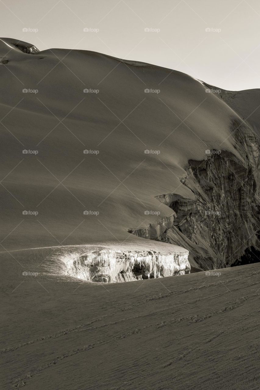 dangers end of a snow covered mountain landscape