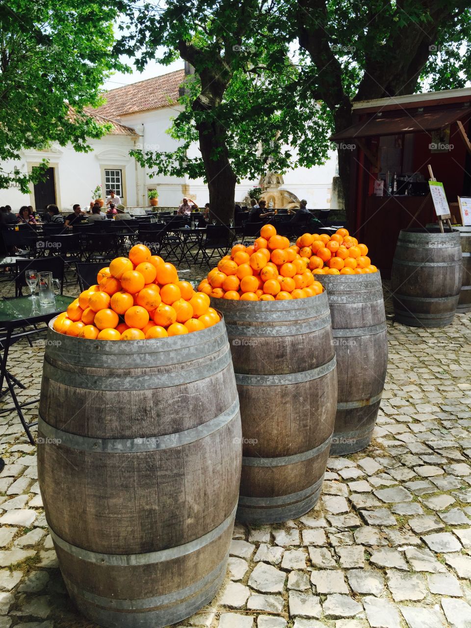 Orange tunnels being sold on the streets of Portugal. Cidade histórica de Óbidos