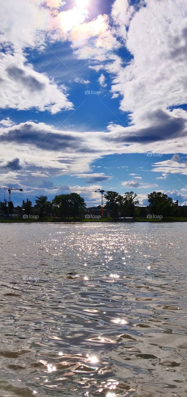 Clouds and Sun/ Reflection on Water