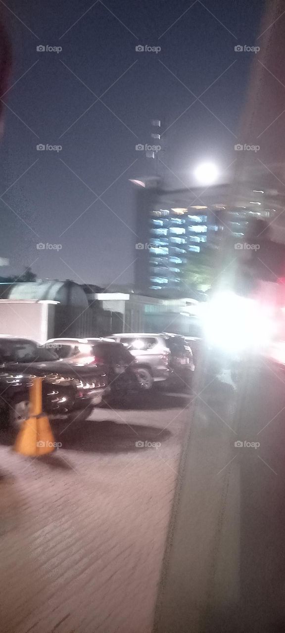 Twinkling windows , the beauty of evening light. Bask in the beauty of evening light with the view of light twinkling from these windows at night