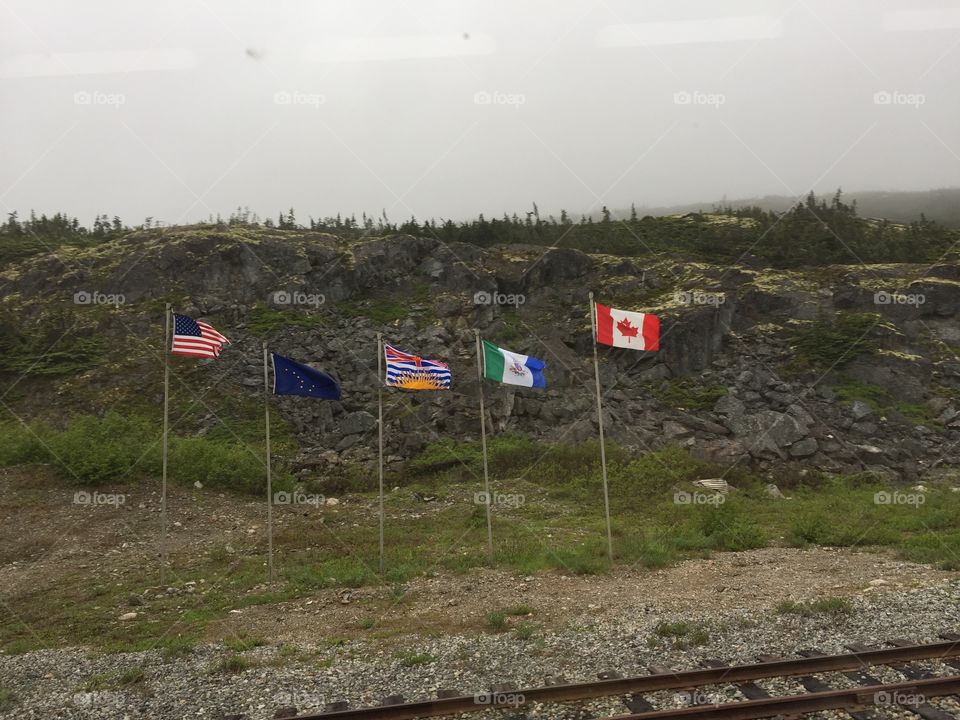 Flags at White Pass, Alaska and British Columbia
