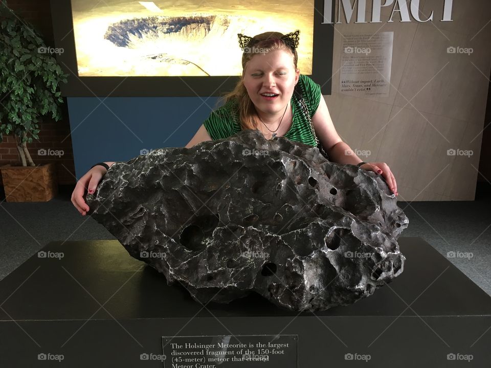 Actual meteorite found near the Meteor crater site in Arizona containing nickel & iron.