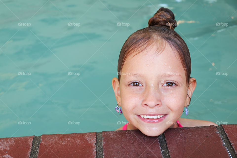 Young girl in pool