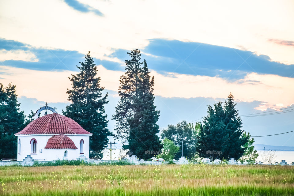 Landscape Rural Cemetery Church In Field
