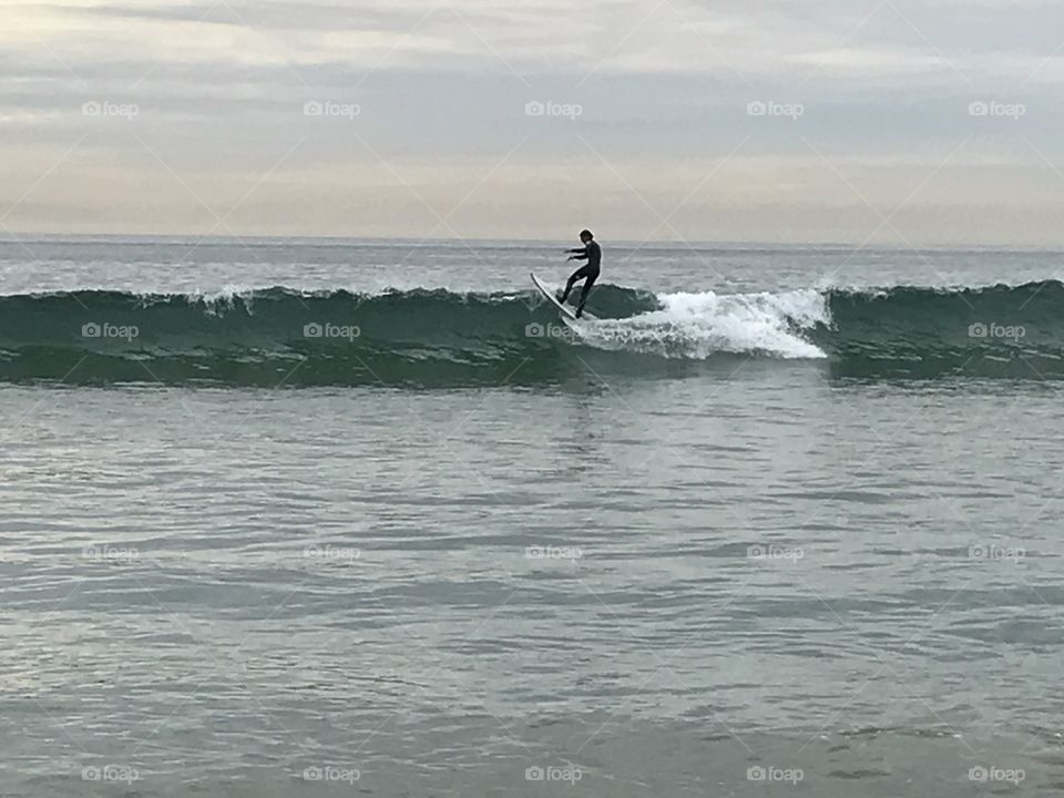 Surfer at manhattans beach Los Angeles 