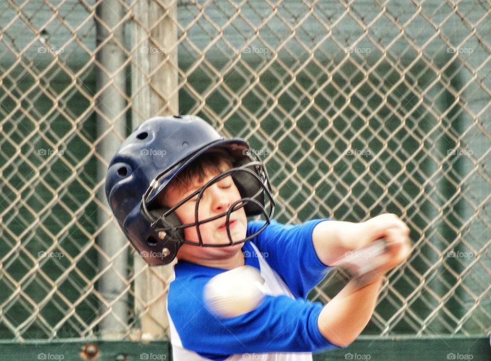 Swinging At A Baseball
