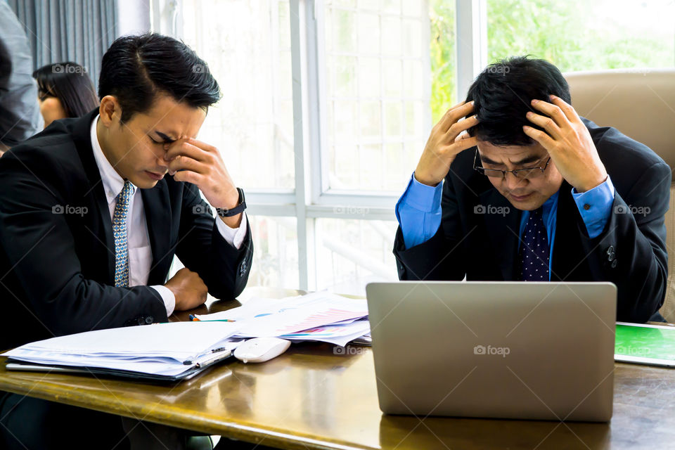 Seriously business people on meeting 